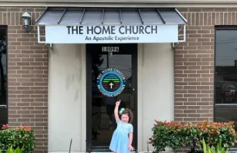 The Home Church building entrance with sign, An Apostolic Experience, Houston TX